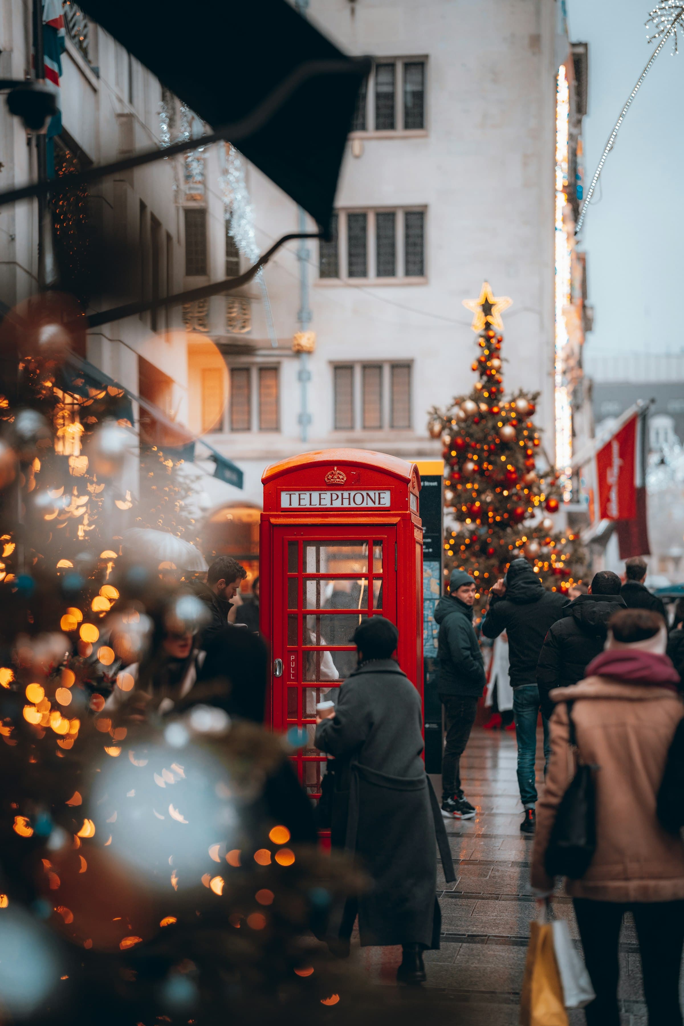 A red phone box in the winter lights